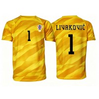 Stroje piłkarskie Chorwacja Dominik Livakovic #1 Bramkarskie Koszulka Podstawowej MŚ 2026 Krótki Rękaw
